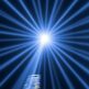 Logo MaxVH Illumination: fasci di luce dei fari allo xenon del Tribute in Light a New York visti dal basso